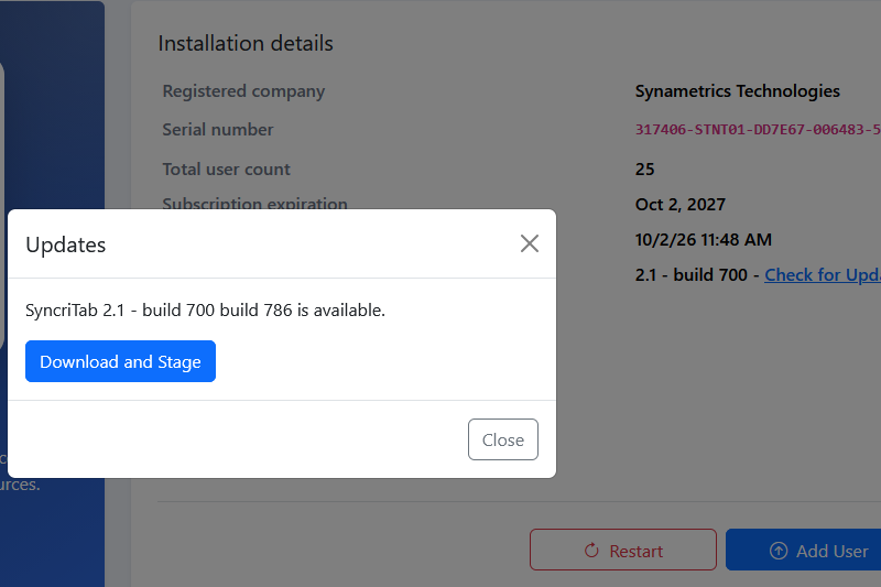 The Check for Updates dialog showing that a newer build is available, with the Download and Stage button.
